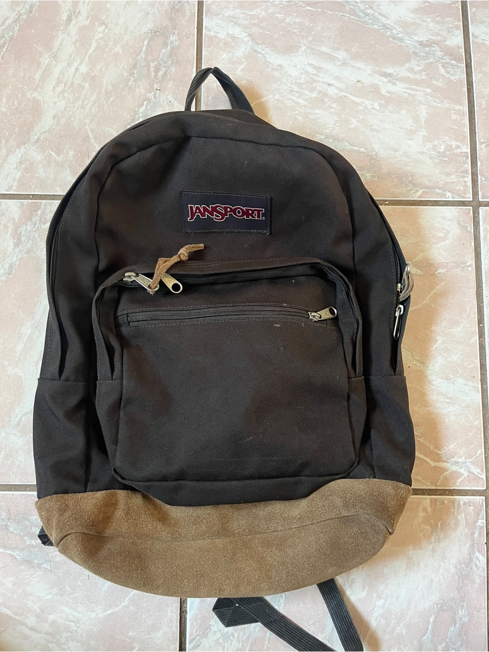 Jansport Black Backpack with Brown Suede Bottom